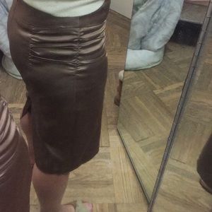 Satiny looking bronze skirt- used